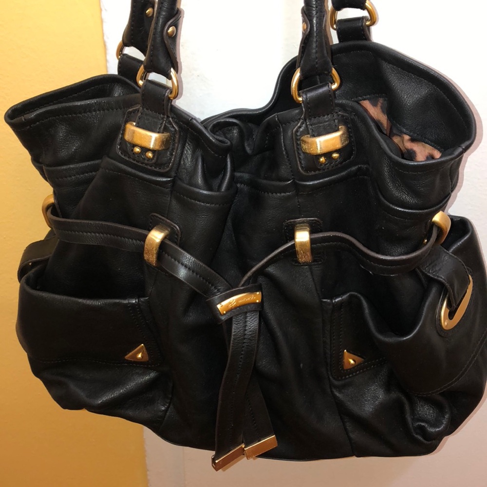 Great medium sized B. Makowsky leather tote!